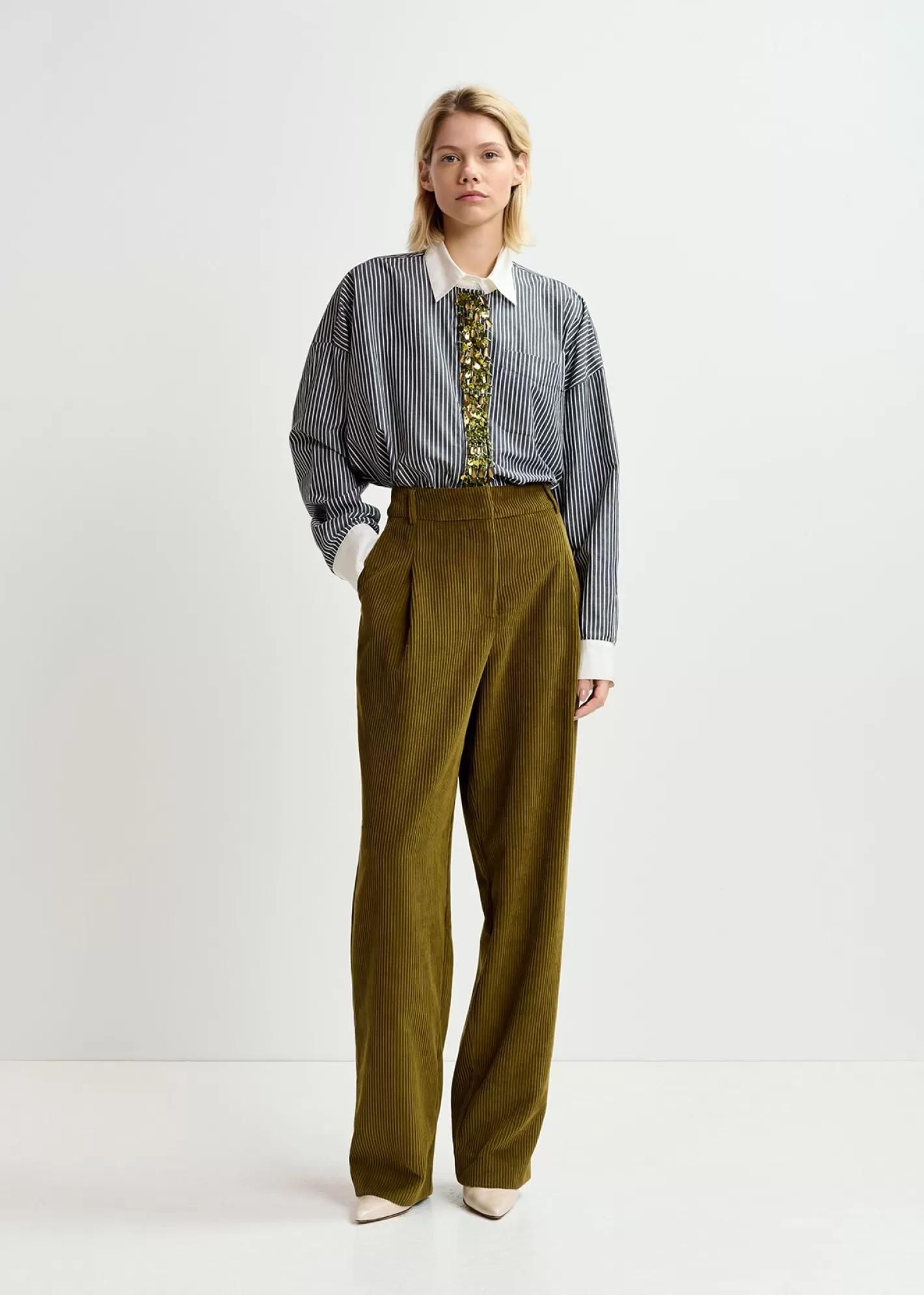 Best Black and off-white striped cotton shirt with embellished button placket Fall 2024 Collection | Tops & Blouses