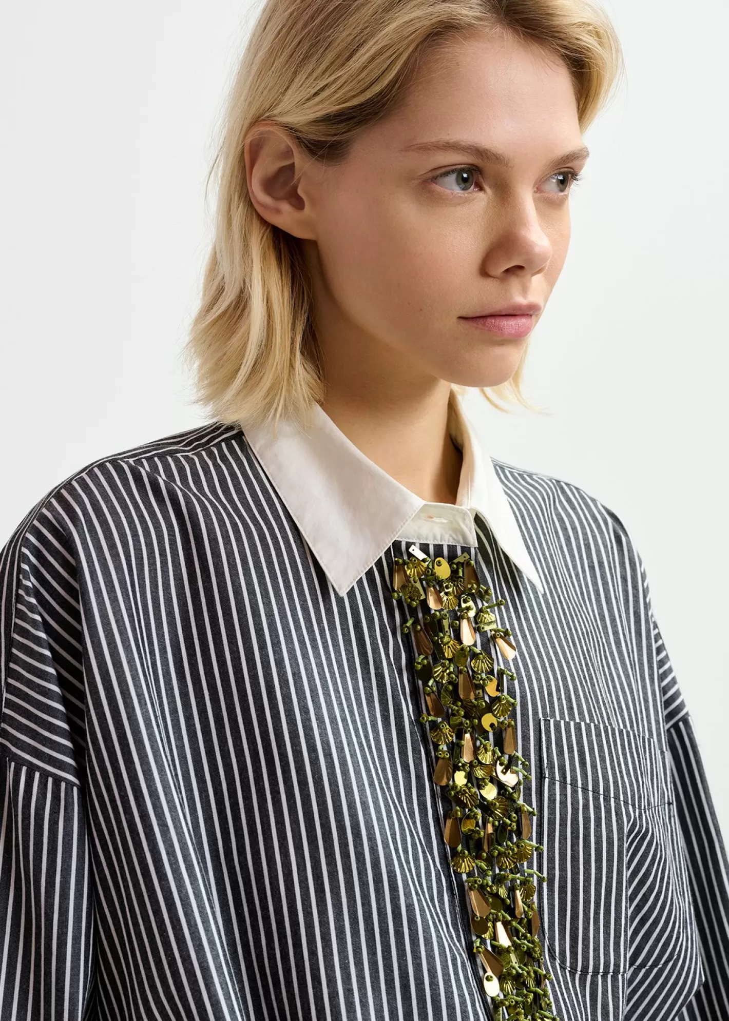 Best Black and off-white striped cotton shirt with embellished button placket Fall 2024 Collection | Tops & Blouses