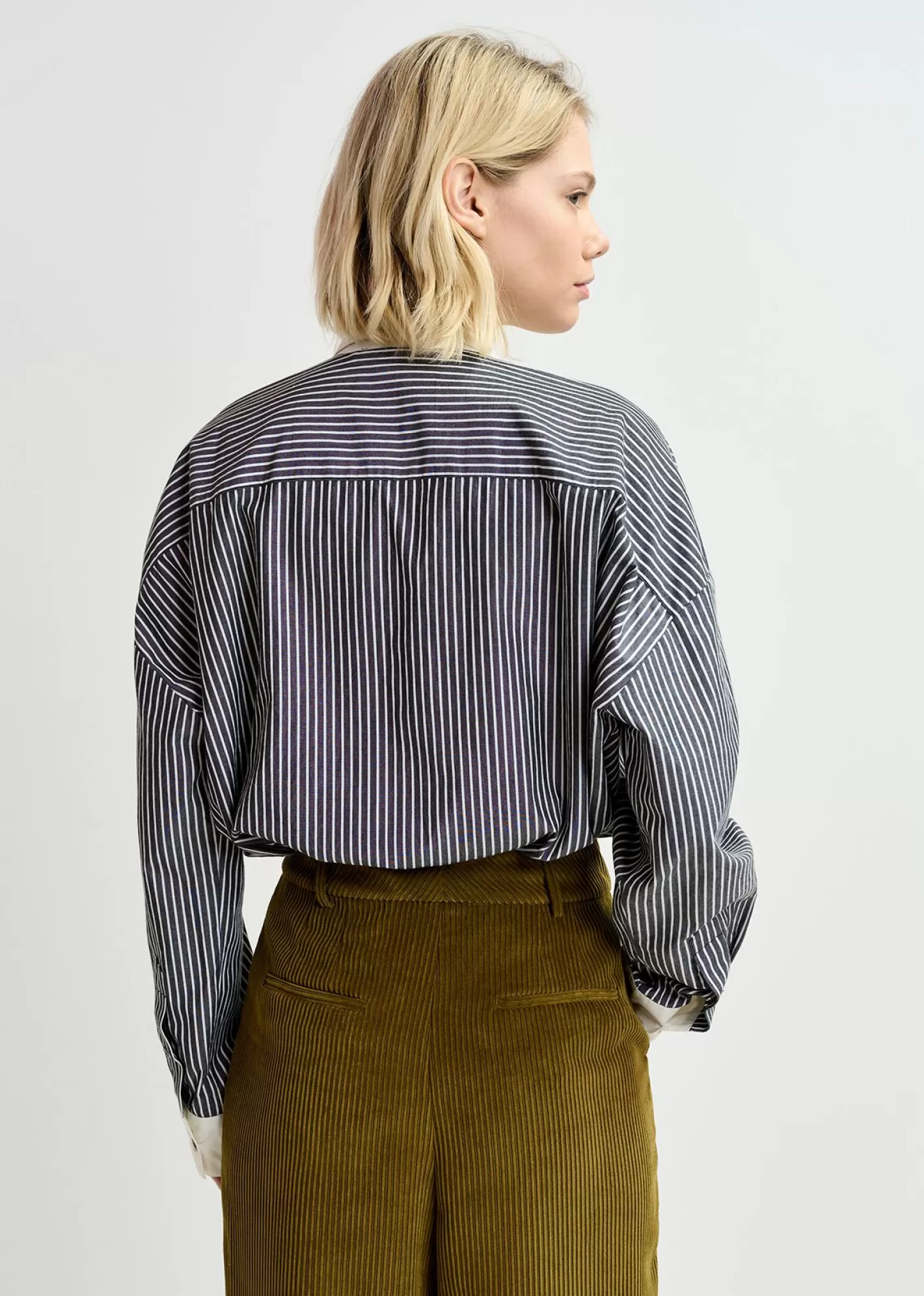 Best Black and off-white striped cotton shirt with embellished button placket Fall 2024 Collection | Tops & Blouses