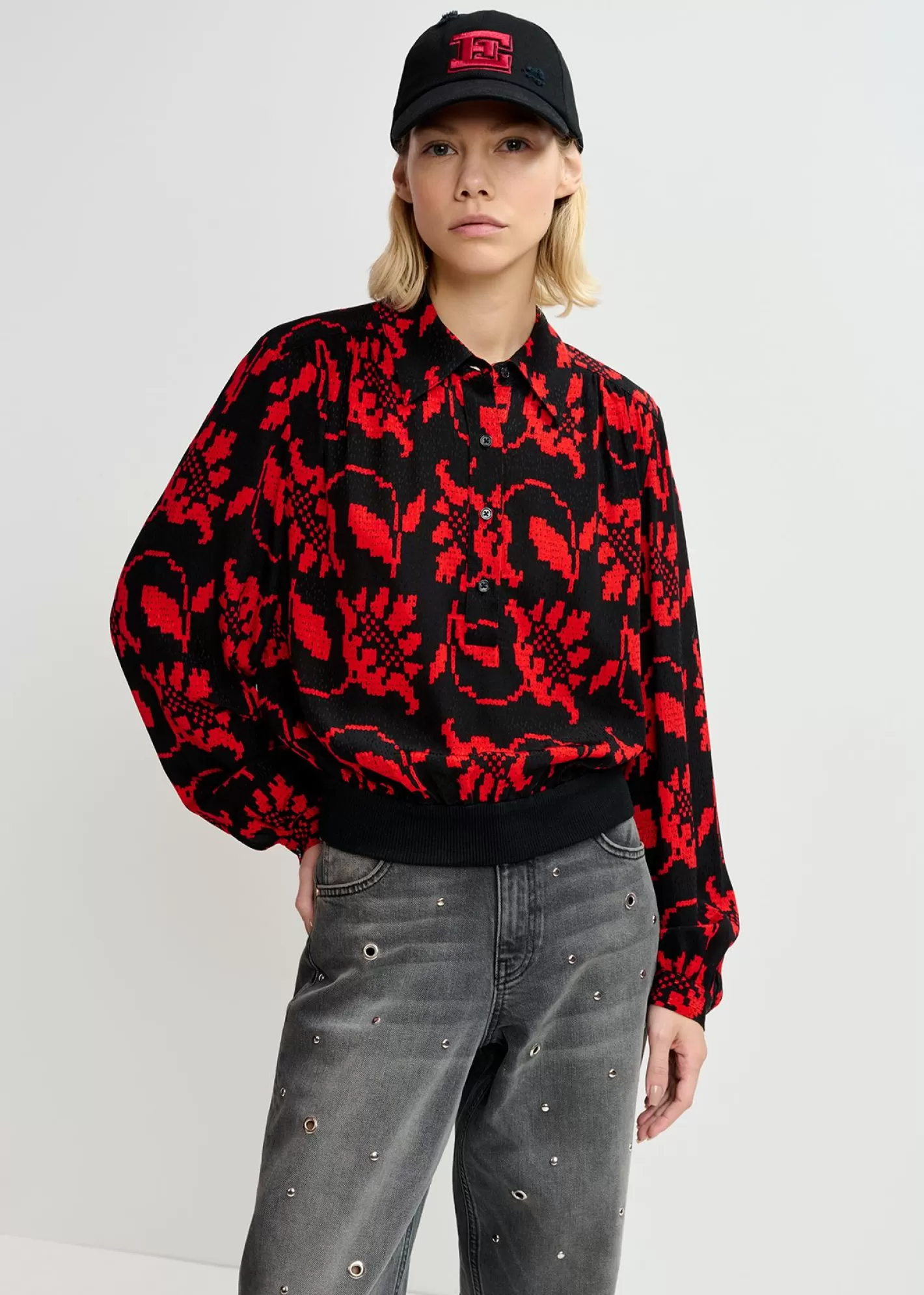 Shop Black and red floral-print polo top Prints | Fall 2024 Collection