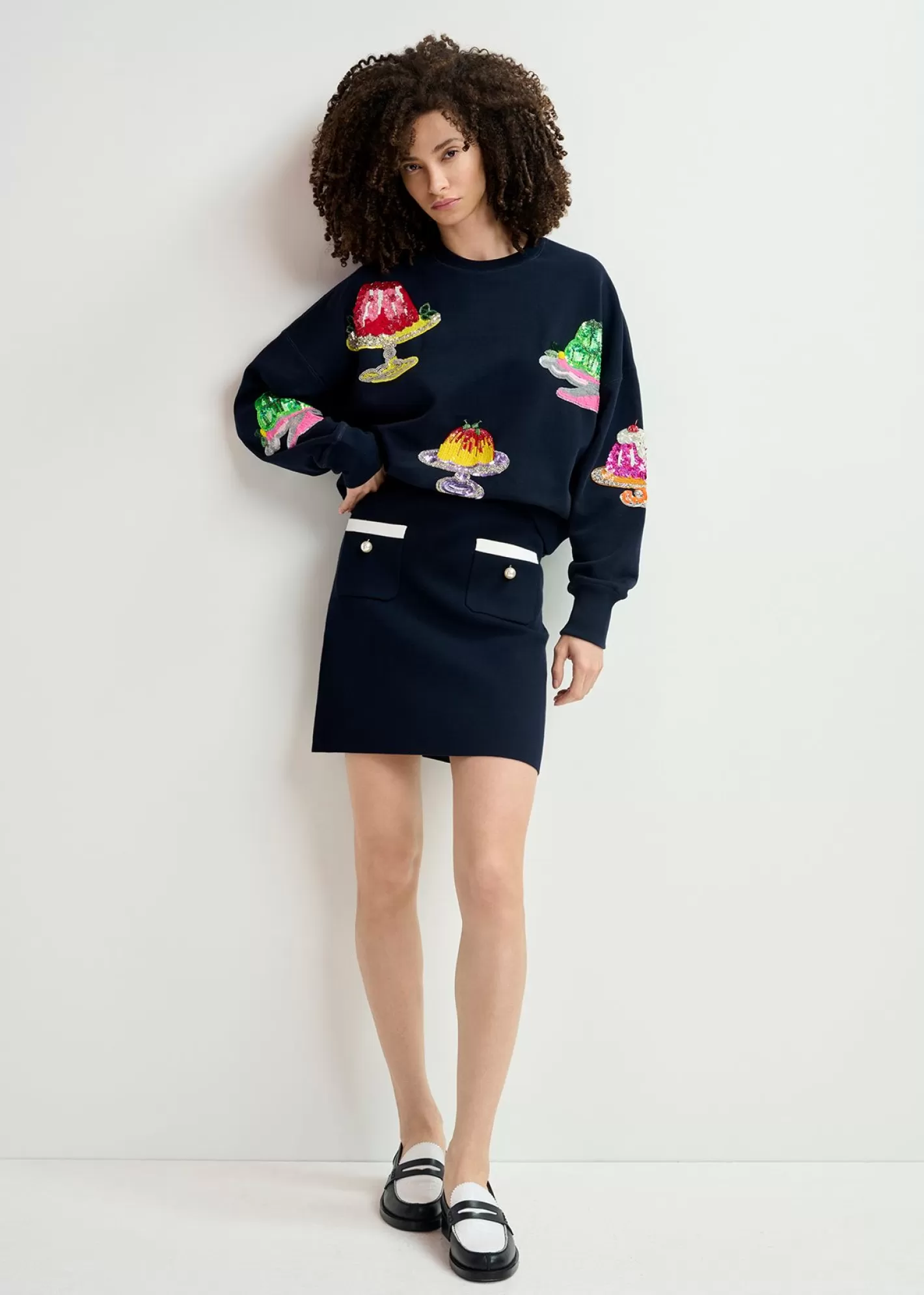 Shop Dark blue knitted skirt with contrasting trims and pearl buttons Skirts